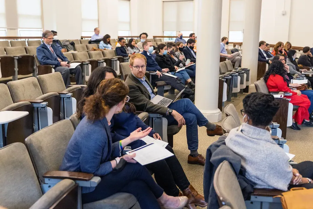 People inside a classroom in the graduate school.